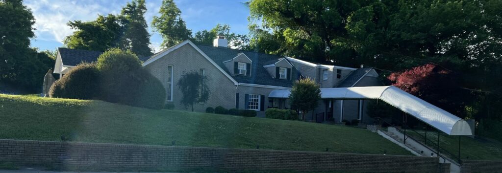 A large house with a lot of windows and doors